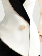 Kaenisse - Elegant White Asymmetrical Blazer with Black Lapels