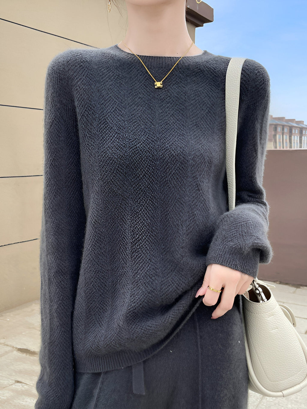 Mika - Merino wool sweater with elegant cutouts