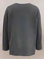 Olivira - Loose-fitting top with a nature-inspired floral pattern
