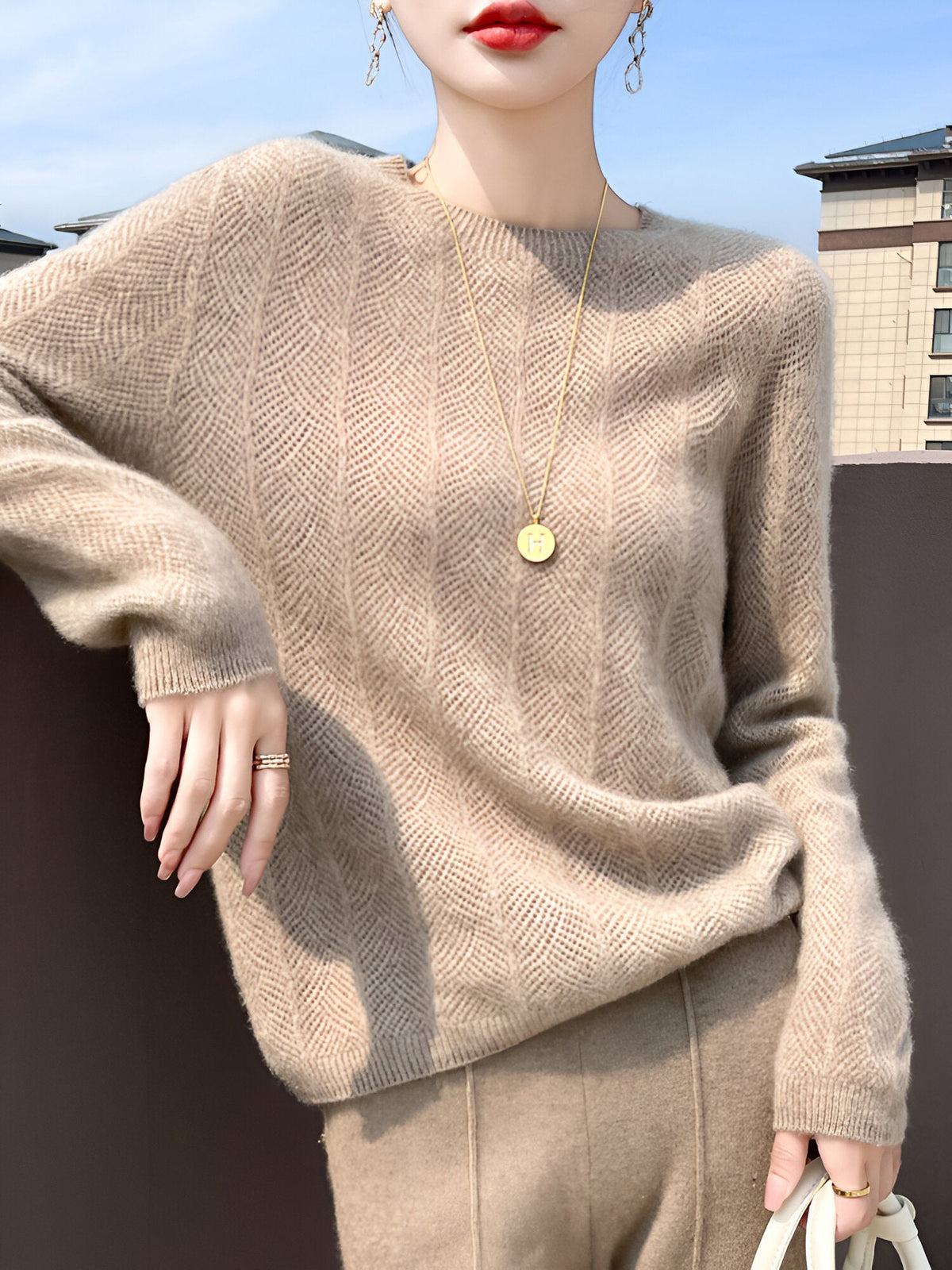Mika - Merino wool sweater with elegant cutouts