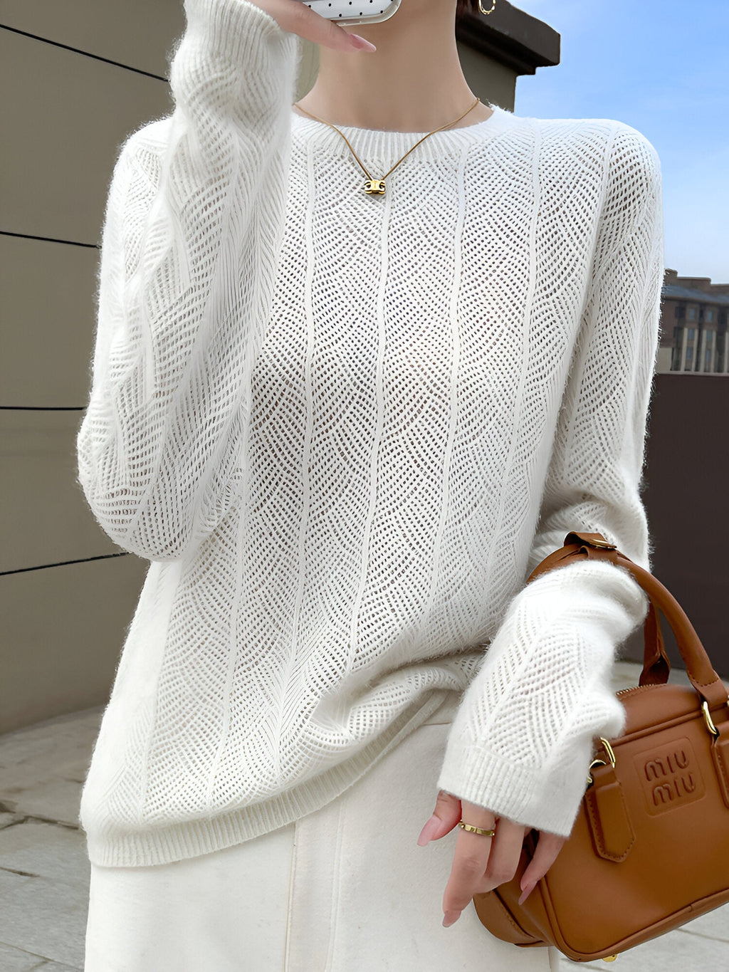Mika - Merino wool sweater with elegant cutouts