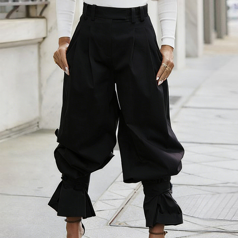 Liesbeth - Women's pleated trousers with frill cuffs
