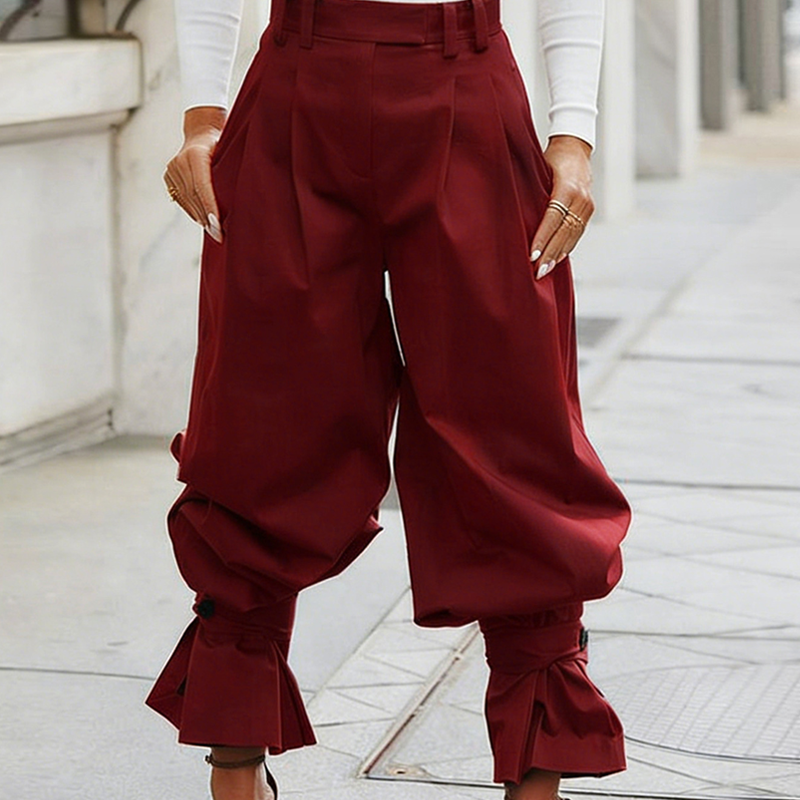 Liesbeth - Women's pleated trousers with frill cuffs