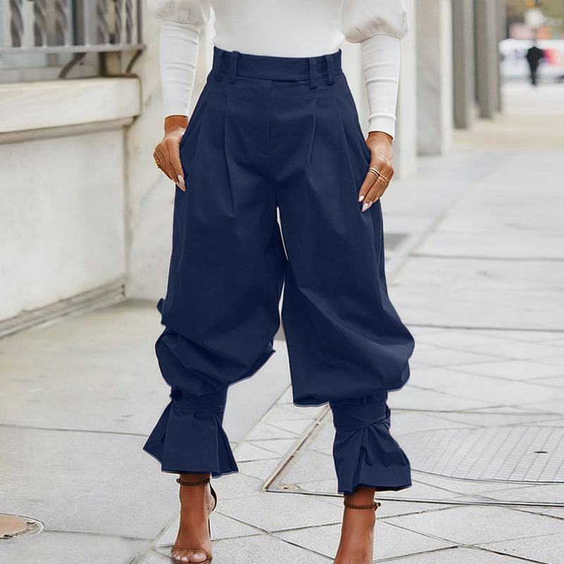 Liesbeth - Women's pleated trousers with frill cuffs